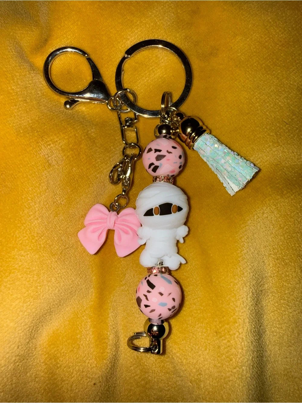 Pink Mummy Charm Keychain with Bow and Iridescent Tassel